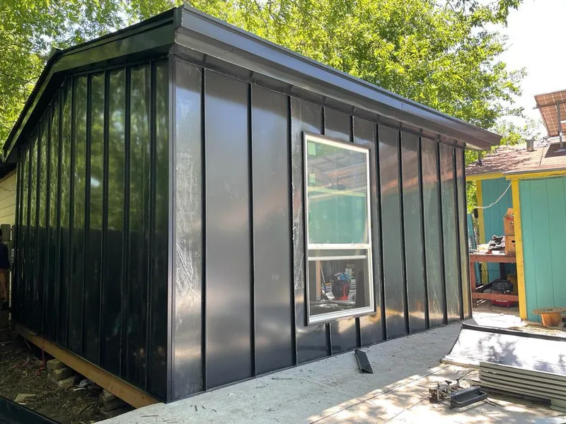 Black standing seam metal wall panels for Roof Inspection in Mahtomedi