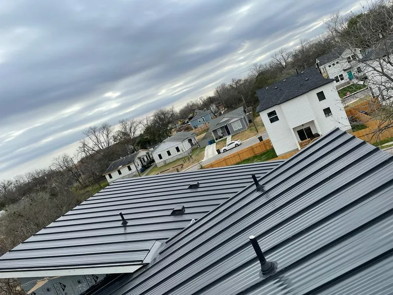 Standing seam metal roof panels with vents for Skylight Repair in Mahtomedi